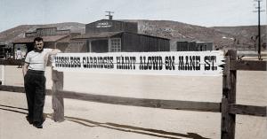 Tourist visiting Mane Street Pioneertown in 1952