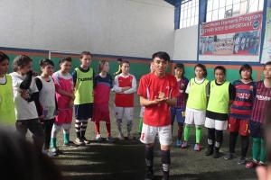 Basir teaching Soccer
