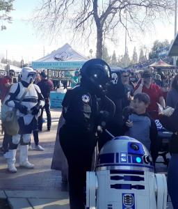 Event Mascots with Drug Free World Booth in background