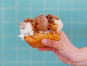 An image of Chef Jam Sanitchat's MOIC-exclusive Sticky Rice Thai Hot Dog Sundae for Night at the Museum at Museum of Ice Cream ATX