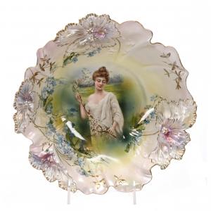 Gorgeous bowl marked R.S. Prussia, 10 ½ inches in diameter with a portrait décor and a lavender and white satin finish.