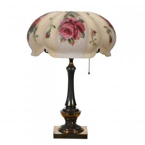 Table lamp by Pairpoint, 20 ½ inches tall, featuring a Venice shade having yellow and white panels with a large pink rose décor, electrified.