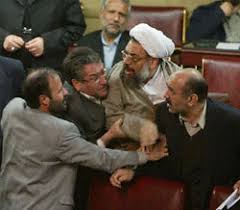 These conflicts of interest have triggered tension among Majlis deputies. On Monday, MP Hamidreza Haji Babaei, who opposes the plan to remove the pegged exchange rate, said, “They want to confront the Majlis with the people."