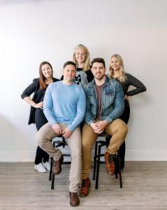 The Bayfront Law Team, with founders Santiago Costa and Matt Campbell sitting in front, and three female staff standing behind them