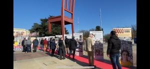 Simultaneous with the virtual conference, organized by five NGOs, a rally and large photo exhibition was held in Geneva regarding the 1988 massacre and the call to action.