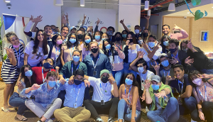 OP360 employees celebrate a group photo for the launch of the new Barranquilla headquarters.