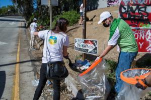 Hollywood Village volunteers tackle some of the worst areas of the neighborhood on their monthly cleanup.