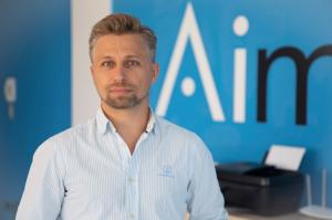 Photo of the founder and AI development pioneer Heinrich Muller