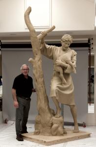 Sculptor Victor Issa at his studio upon completion of the clay work of The Lost Sheep.