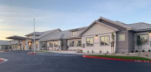 Silverado Red Rock Memory Care Community against the backdrop of the bright blue Nevada sky.