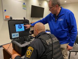 Officer Martinez is Given of the Baseline Concussion Scan at the Woodbury Police Department