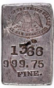 San Francisco Mint silver ingot, .999 fine, weighing 6.61 oz. and showing the old style, pre-World War II logo ($7,230).