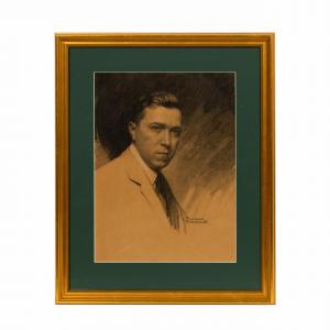 Portrait of Mr. Woodruff by Norman Rockwell (N.Y., 1894-1978) showing Woodruff as a young man, charcoal on paper, artist signed ($43,750).
