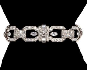 Circa 1920s Tiffany & Company custom Art Deco platinum and diamond bracelet comprised 20 ctw old European cut, modern cut and various cut diamonds ($112,500).