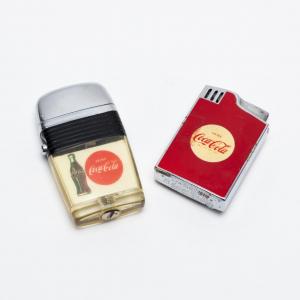 Two of Mr. Woodruff’s personal advertising lighters, one a Hadson “Blue Bird” musical lighter with Woodruff’s initials and a Scripto Vu-Lighter with his name ($3,438).