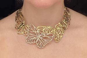 Papillon style collar necklace in 18kt gold filagree with approximately six carats of diamonds (to be sold Day 2; est. $15,000-$25,000).