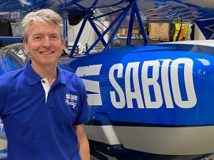 Rich Goodwin Poses Next to Sabio Aircraft