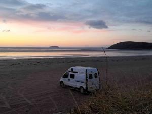 Uncover Britain Campervan on beach