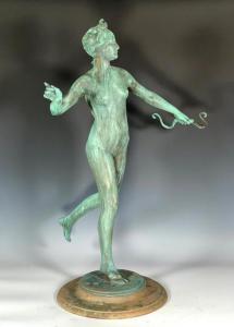 One of two bronzes statues with green verdigris patina signed by William MacMonnies (American, 1863-1937), this one titled Diana (1890) (est. $10,000-$12,000).