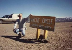 <img src=https://rsvtv.com/travel/arctic-circle-adventurer-wins-gold-medal-in-fiction/"oliver phipps.jpg" alt="oliver phipps at arctic circle by sign ">