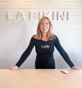 L.A. Bikini owner behind counter