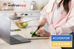 Woman cooking while following instructions on laptop; My Walrus App and #CookForUkraine logos shown