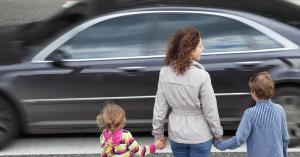 Albuquerque Signs Contract for Automated Speed Enforcement Program - image of woman with children as fast car speeds by
