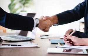 Thanicare and San Diego Pet Driver Handshake Image