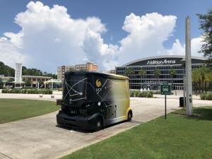 COAST P-1 Autonomous Shuttle on the University of Central Florida campus in front of the Addition Arena in Orlando.