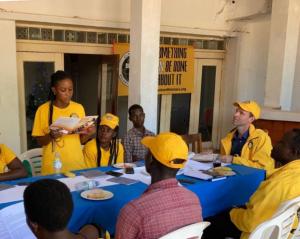 Kruijt trains Rev. Sembuya’s Volunteer Ministers group with the skills covered in the Scientology Handbook.