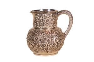 Tiffany sterling repousse pitcher, T Mark, circa 1870s.