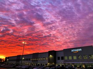 Amazon office with pink sunset behind it