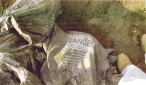 Bag of asbestos at landfill