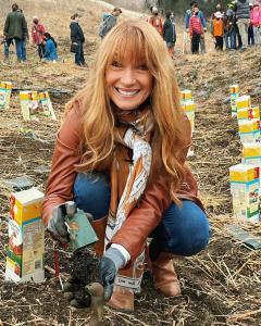 Jane Seymour volunteers to plant native grasses at Paramount Ranch during a Young Hearts Volunteer Experience in December 2021.