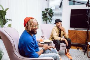 Dennis Reed sits next to David "Dae-Lee" Arrington