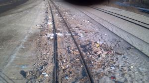 Spilled waste at the landfill waits to be washed away