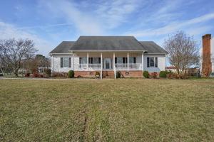 Well maintained 3 BR/2.5 BA home on .62 +/- acre lot in Swan Estate subdivision o	Adjacent .50 +/- acre corner building lot (305 Vaughans Ln.) o	Home & building lot will be offered individually and together.