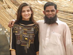 Muskaan, 22, a graduate of IBA Karachi and now working as a business analyst – with her father Amjad Ali, an auto-rickshaw driver