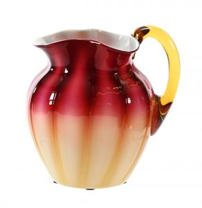 Plated amberina water pitcher by New England glass, 6 ½ inches tall by 6 ½ inches wide, flawless, boasting excellent color and in excellent condition.
