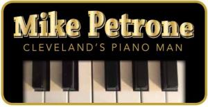 The logo of Cleveland's piano man Mike Petrone.  His name in gold on a piano keyboard.