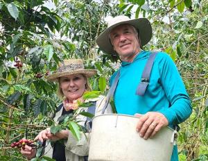 Steve and Joanie Wynn on their Kona coffee farm
