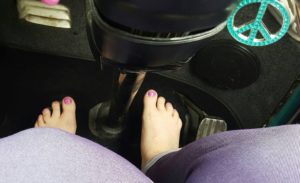 lady driving barefoot