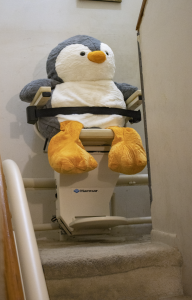 Madison's Penguin on Helix Curved Stairlift