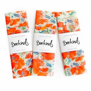 Bee Kind beeswax wrap in hand-painted halfmoon orange floral pattern