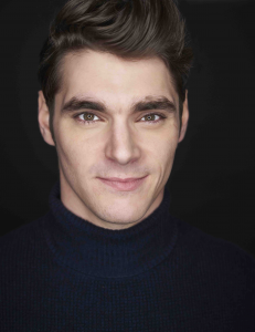 This is a headshot of R J Mitte, an actor and disability rights advocate. He appeared in Breaking Bad on AMC and will appear in Triumph, a new film about a  high school senior who wants to join the wrestling team.