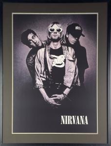 Rare 1993 Nirvana promotional poster, signed by the full band – Kurt Cobain, Krist Novoselic and Dave Grohl.