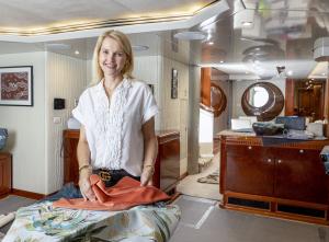 A photo of interior designer Keeley Green working inside the superyacht Princess Iluka