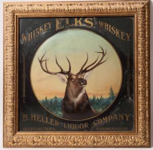Circa 1901 original Elks Whiskey painted raised metal sign, pulled from the Tombstone Museum with a painting of an elk in a mountain forest setting ($1,560).
