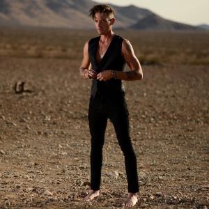 Alternative singer and songwriter Jameson Burt in the middle of the desert.