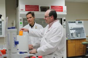 Ed Elder, administrative director of the Lachman Institute for Pharmaceutical Development (right), with Mark Sacchetti, scientific director of the Zeeh Pharmaceutical Experiment Station at the University of Wisconsin–Madison School of Pharmacy